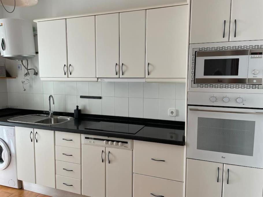 Apartamento Amura En Playa De Las Cucharas كوستا تاغيسي المظهر الخارجي الصورة